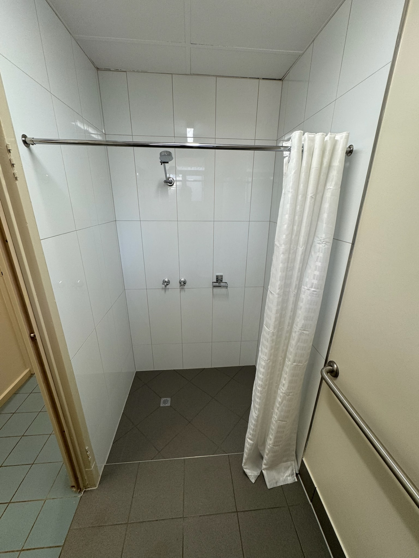 Completed tiled shower and bathroom floor
